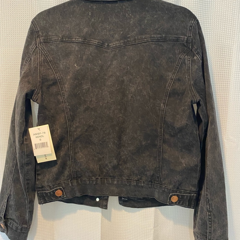 Black denim jacket with copper buttons